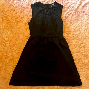 Black sleeveless zip up dress